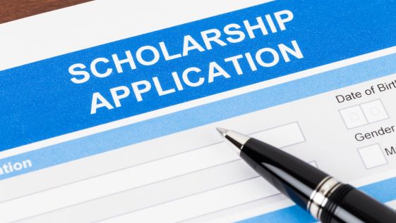 Laptop with screen reading Scholarships